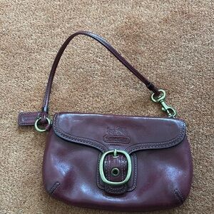 Coach vintage wristlet in burgundy
